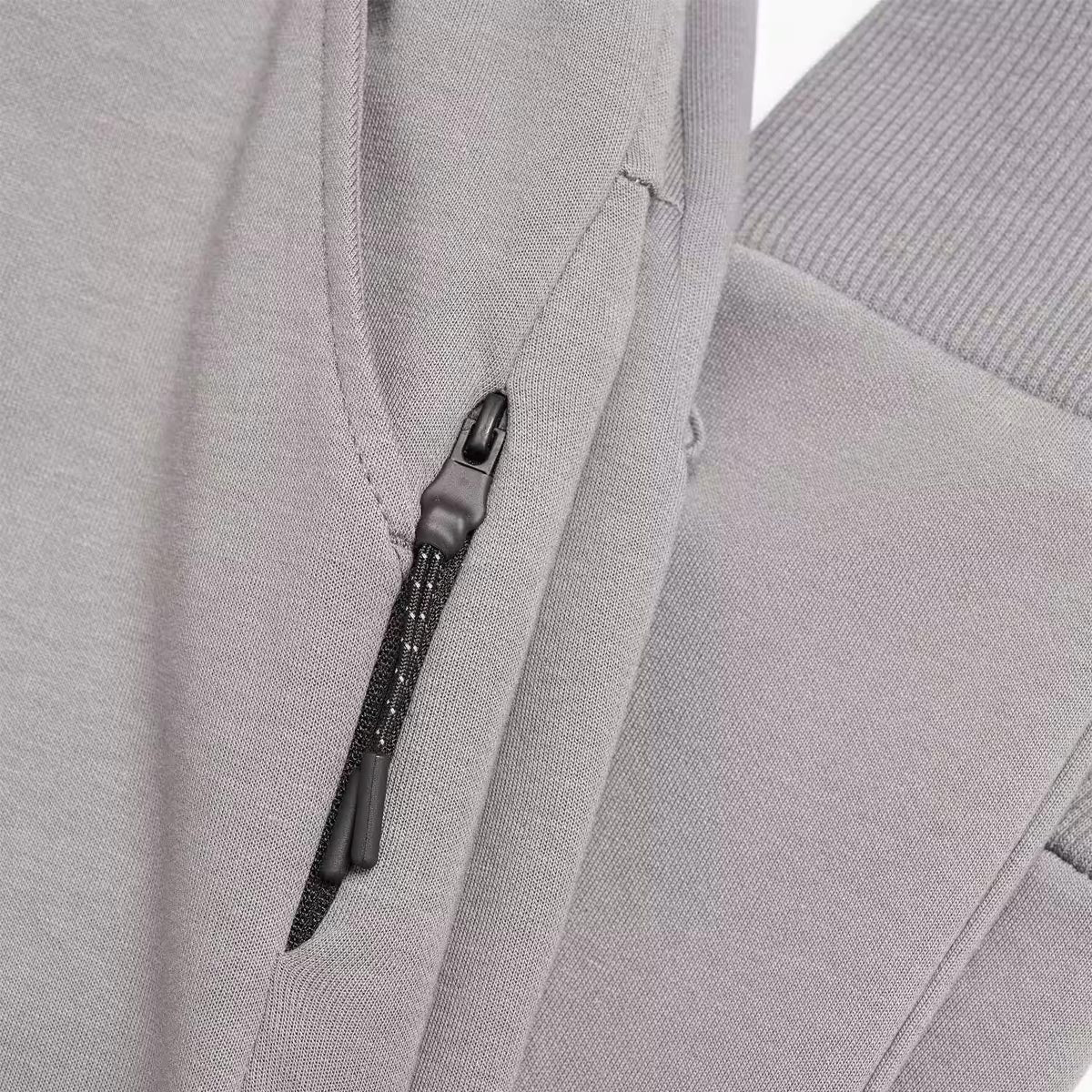 BACK ZIP STYLE GREY TROUSER