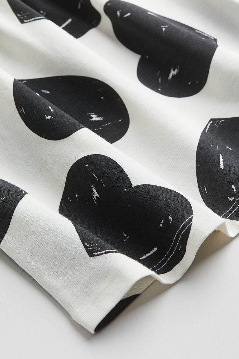BLACK HEART ALLOVER PRINT SLEEVELESS FROCK