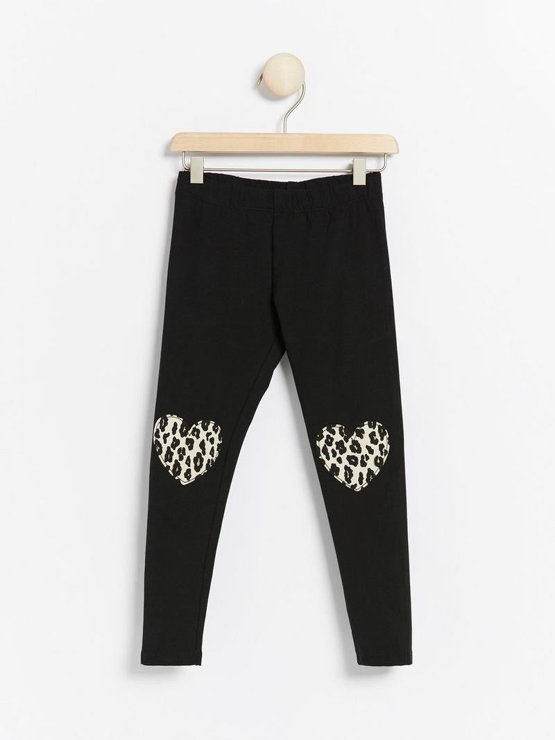 Leopard heart print tights