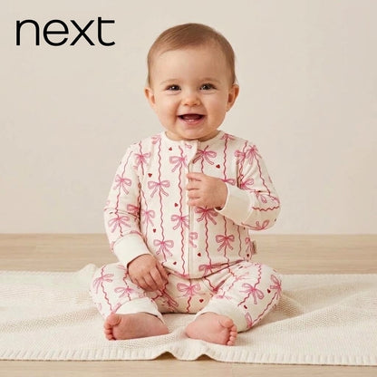 KNOT PRINT ZIPPER ROMPER